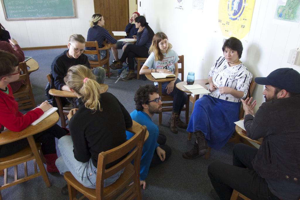 Joe Ahearn (pictured in blue sweatshirt) talking with students during his class, Analog Data Management class. Photo by Faythe Levine